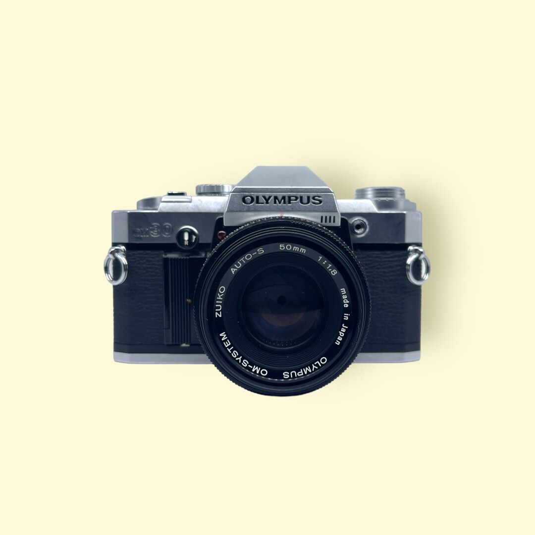 Olympus OM30 35mm Film Camera + Olympus ZUIKO F1.8 Prime Olympus OM30 35mm Film Camera + Olympus ZUIKO F1.8 Prime