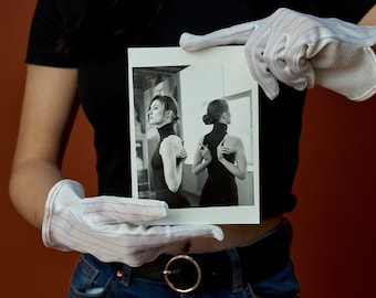 Darkroom print: Reflection (Wings) postcard sized gelatine silver hand print on Ilford Multigrade RC gloss paper