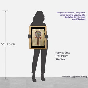 May include: Hand-painted Ankh symbol on papyrus, framed in gold. The papyrus measures 13x17 inches (33x43 cm).