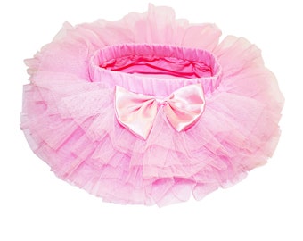 Pink baby tutu skirt with a decorative bow. One size fits 3-12 months. Cute baby tutu. Buy two and SAVE!