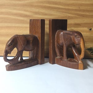 Pair of vintage solid wood hand carved elephant bookends