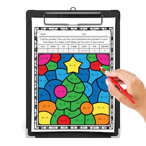May include: A color-by-number math worksheet on a black clipboard. The worksheet features a Christmas tree design with various math problems. A hand holds a red pencil, coloring the worksheet. The instructions are at the top of the worksheet.