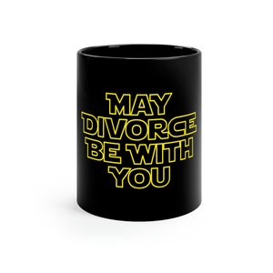 May include: Black coffee mug with the text "May Divorce Be With You" in yellow.