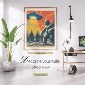 May include: A framed art print featuring a Bigfoot and UFO scene with a retro color palette. The artwork has a vintage aesthetic, with the text "Digital Download" at the top and "Decorate your walls Shop Now" at the bottom.
