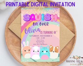 May include: A printable digital invitation for a squishmallow themed party. The invitation features a rainbow background with the words "Squish On Over Olivia is Turning 8!" and a group of squishmallows. The invitation includes the date, time, and location of the party, as well as an RSVP contact.