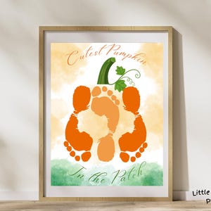 May include: A printable art print featuring a pumpkin made from two orange footprints with a green stem and leaves. The text "Cutest Pumpkin in the Patch" is written below the pumpkin.