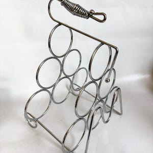 Vintage skulptural postmodern krom vinställ för sex flaskor (6) - futuristisk pyramidstil - italiensk design liknande Alessi