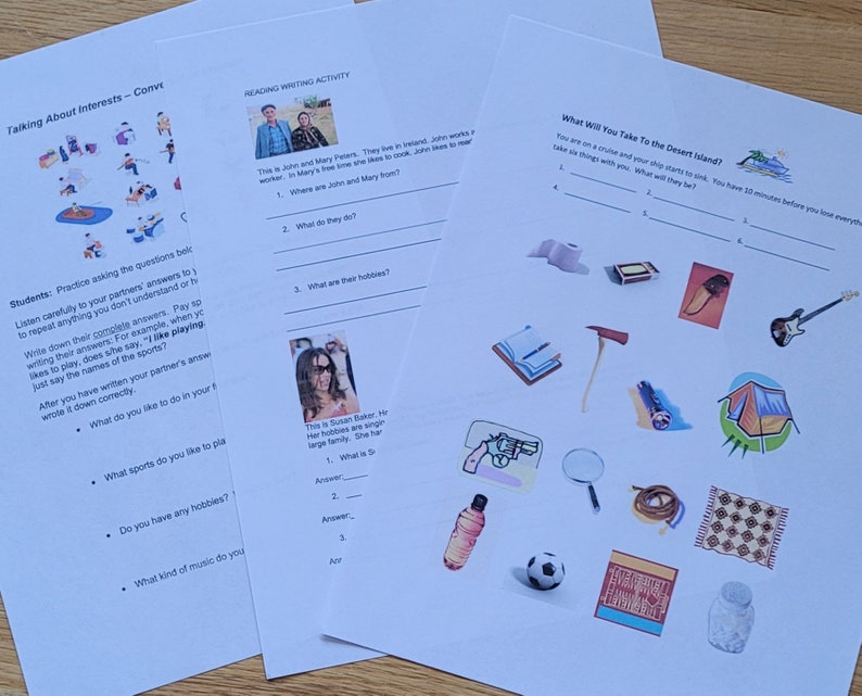 May include: Three sheets of white paper with English language learning activities. One sheet is titled "Talking About Interests - Conversation", another "Reading Writing Activity", and the third "What Will You Take To The Desert Island?"