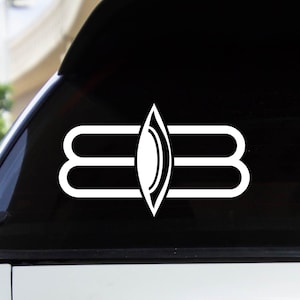 May include: A white vinyl sticker with a stylized image of the Hindu symbol Om, also known as Aum, on a black background. The symbol is a stylized representation of the sound of the universe.