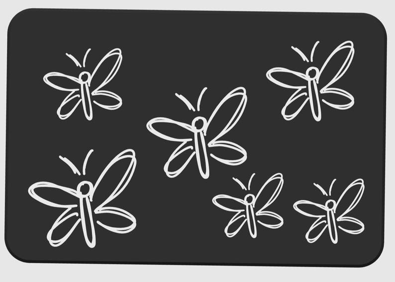 May include: A black rectangular surface with rounded corners features a pattern of five white butterfly illustrations. The butterflies are drawn with simple, sketchy lines, giving them a whimsical appearance. The overall design is clean and minimalist.