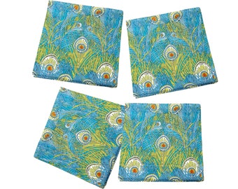 May include: Four square cloth napkins with a peacock feather design. The napkins feature a teal background with yellow, white, and orange accents. The peacock feather pattern is repeated across each napkin, creating a cohesive set.