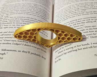Porta-pagina per libri con pollice
