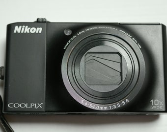 Nikon CoolPix S8000 digital camera, 14.2 MP, 720p HD video recording, memory card, accessory pack, tested