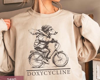 Doxycycline Dachshund Bicycle Sweatshirt: Pharmacy Veterinary Gift