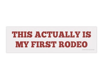 This Actually Is My First Rodeo funny bumper sticker | silly quote vintage retro western car decal