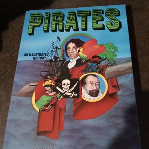 May include: A book titled "Pirates: An Illustrated History" by David Mitchell. The cover features a colorful illustration of pirates, a ship, and a parrot.