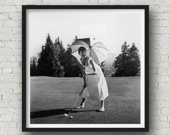 Audrey Hepburn playing golf | 1955 | Museum Quality Poster