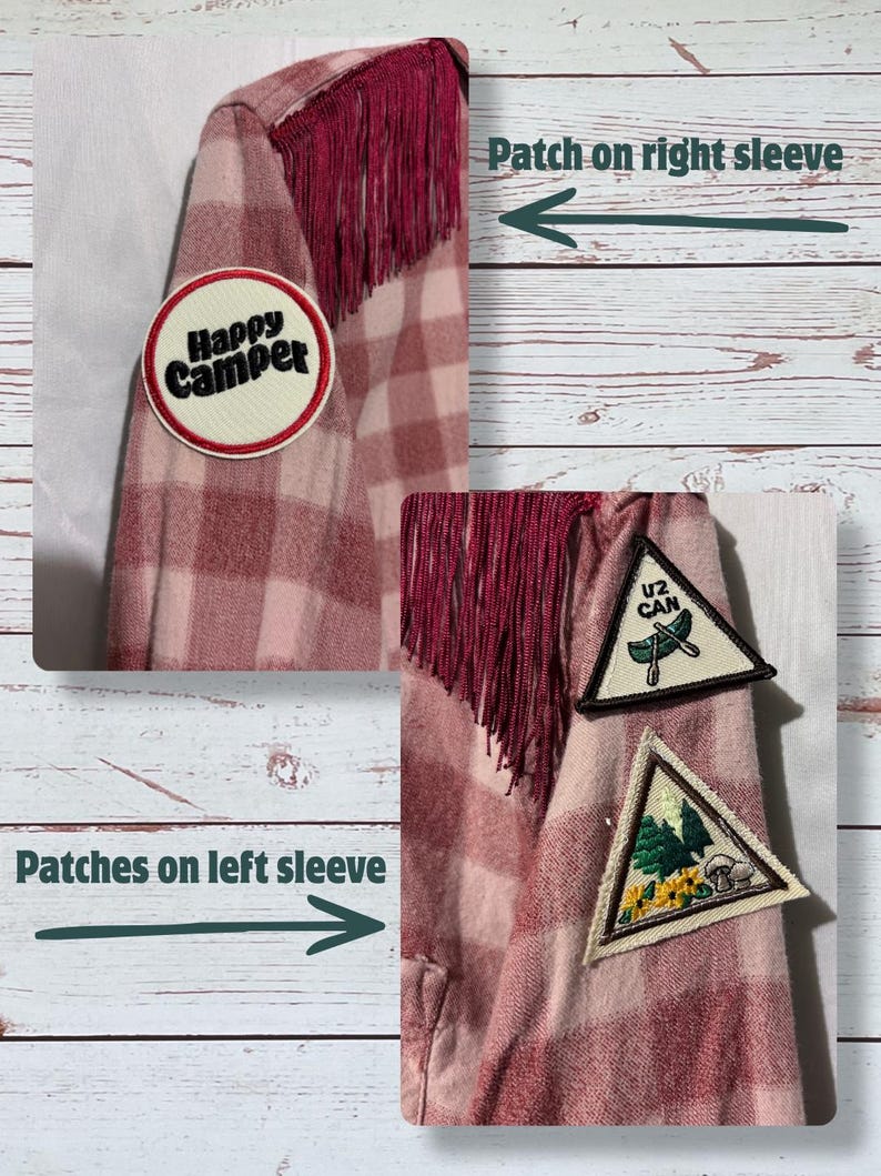 On the top of the right sleeve there is a patch that says "Happy Camper" on it and on the other sleeve are 2 up-cycled scout patches that are camping themed.