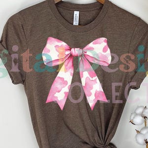 Pink Cow Print Coquette bow png Coquette clipart design trending png retro mama png pink bow png aesthetic png tee shirt designs western png