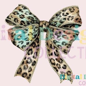 May include: A large, brown and blue leopard print bow with rhinestones. The bow is tied in a classic style with the tails hanging down.