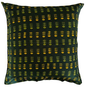 May include: A dark green pillow cover with a repeating pattern of yellow and green stylized plant motifs.