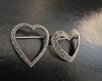 A Pair of Vintage Openwork Sterling Marcasite Heart Brooches