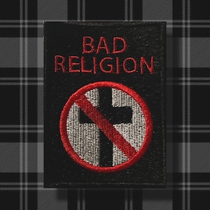 Pode incluir: Etiqueta bordada preta e vermelha com as palavras "BAD RELIGION" e um círculo vermelho com uma cruz branca com uma linha vermelha a atravessá-la.