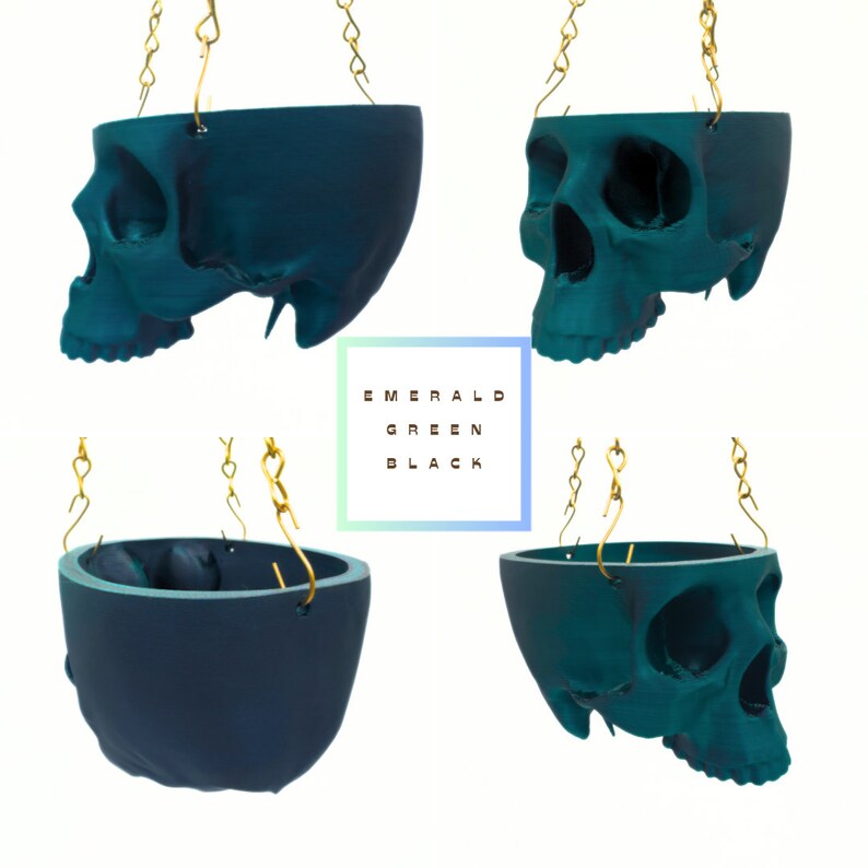 May include: Four teal skull-shaped hanging planters with gold chains. The text "EMERALD GREEN BLACK" is visible in the center of the image.