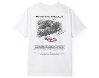 May include: White t-shirt with a black and white photo of a red race car on a track. The text "Monaco Grand Prix 2024" is printed on the shirt.
