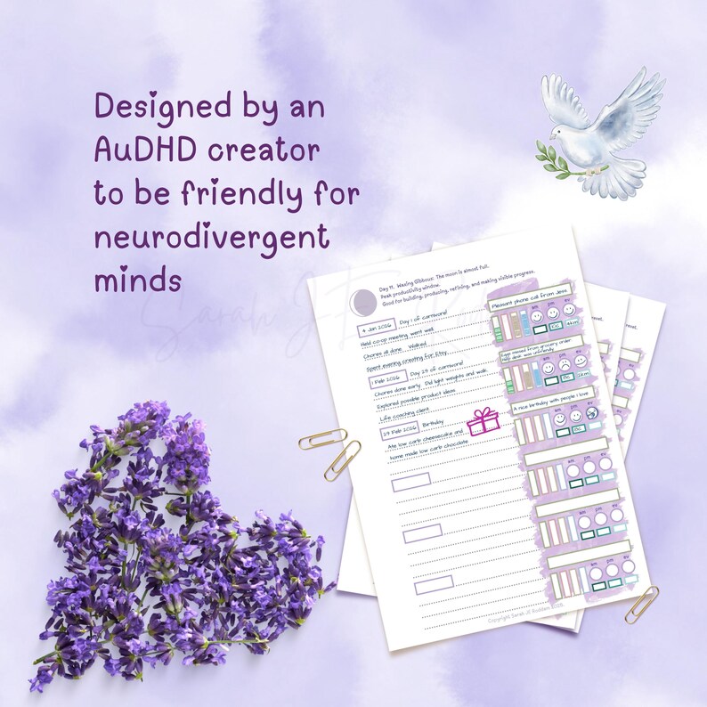 May include: A planner with a lavender heart, a dove illustration, and gold paper clips. The planner pages have a purple and white design with text. The text reads "Designed by an AuDHD creator to be friendly for neurodivergent minds."