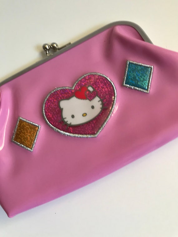 Vintage Hello Kitty pink wrist bag new with tags.