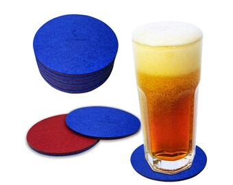 May include: A set of 10 blue felt coasters with a single red felt coaster. The coasters are round and have a slightly textured surface. A glass of beer is sitting on one of the blue coasters.