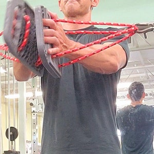 Open hand flys with the IsoBoard provide unique Isolation to the pectoral muscles.