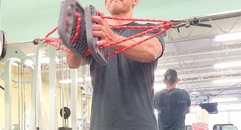 Open hand flys with the IsoBoard provide unique Isolation to the pectoral muscles.