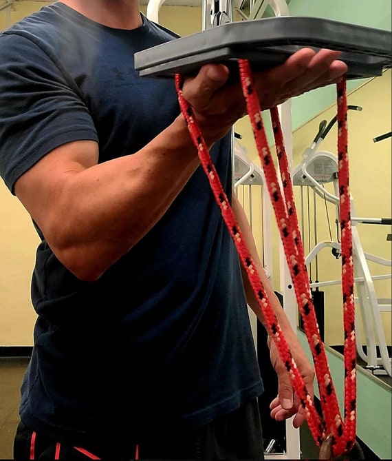 Weight lifting attachment for muscle building and fitness.