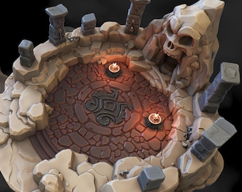 May include: A detailed, stylized diorama of a skull-shaped structure with a central pit. The pit features a dark, patterned floor and two small, glowing braziers. The surrounding structure is made of tan and gray stone, with several pillars.