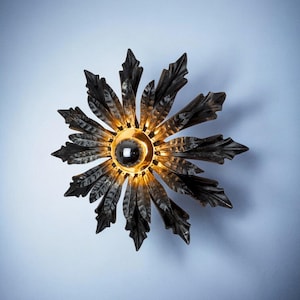 Sun wall lamp by ferro arte, metal leaf, Spain, 1970