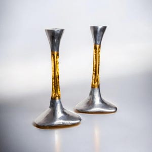 Pair of Brutalist candlesticks by David Marshall, bronze and aluminum, Spain, 1970