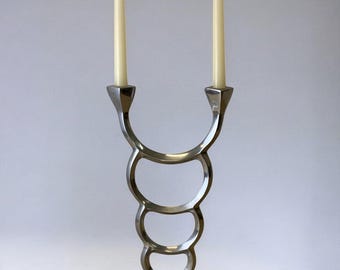 Candelabro biomórfico, aluminio macizo, España, circa 1970