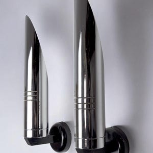 Pair of Raak tubular wall lamps, space-age chrome design, Germany, 1970