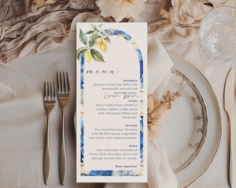 May include: A menu card with a watercolor illustration of lemons and blue and white tiles. The menu features Italian dishes, including arancini, pasta, sea bass, and chocolate torte. The text reads "menu", "Antipasto", "Arancini", "Primo", "Spicy Vodka Pasta", "Seconde", "Pan-Fried Sea Bass", "Dolce", "Dark Chocolate and Almond Torte", and "Buon appetito!"