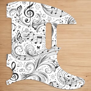 May include: White guitar pickguard with a black musical notes and floral design. The pickguard features treble clefs, musical notes, and decorative swirls. The design is a detailed, artistic pattern, suitable for musicians and music enthusiasts.