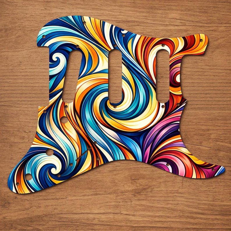 Puede incluir: Un colorido golpeador de guitarra con un dise&ntilde;o abstracto y ondulado en tonos de azul, amarillo, naranja, rojo y morado. El golpeador tiene tres recortes para pastillas y varios agujeros para tornillos. Fondo de madera.