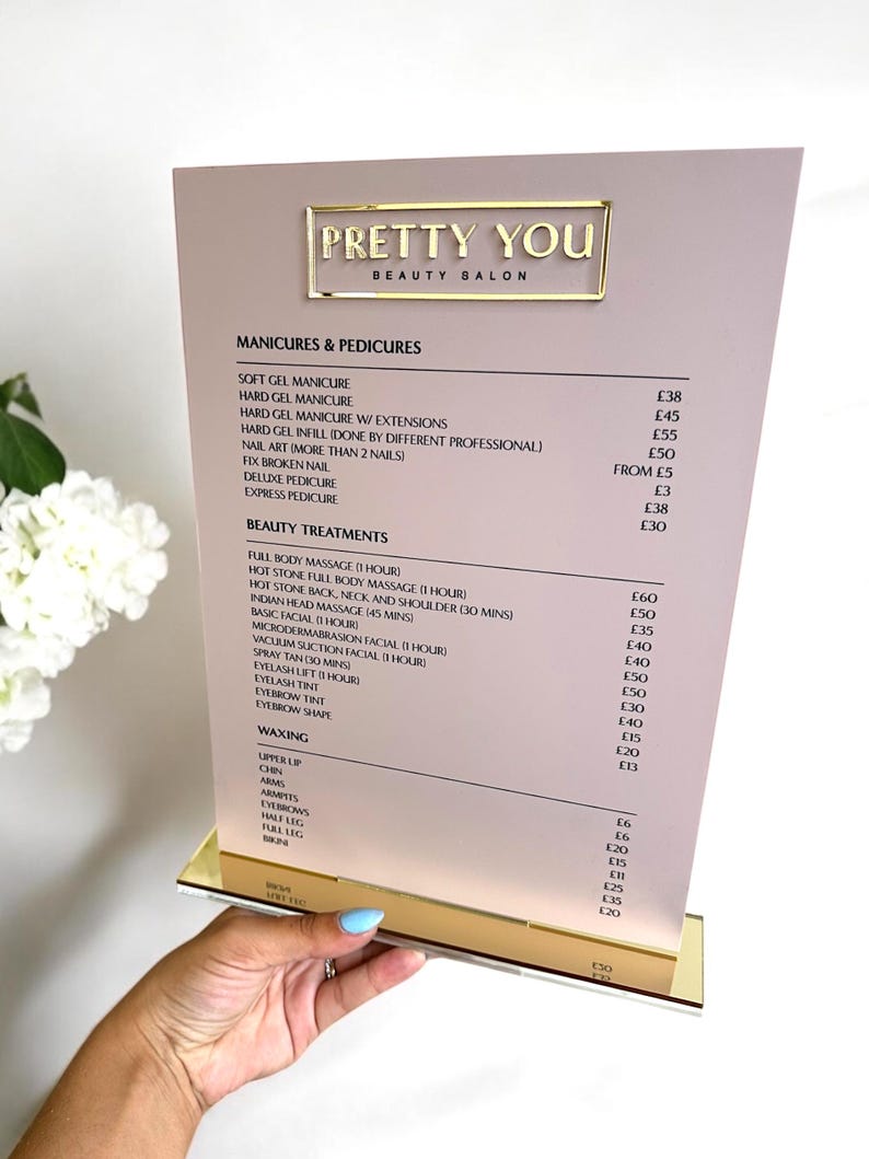 May include: A beauty salon menu with the text "PRETTY YOU BEAUTY SALON" in gold lettering. The menu lists various manicure, pedicure, and beauty treatment services, including prices in British pounds.