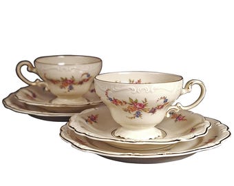 Juego de té Rosenthal Pompadour: tazas, platillos y platos con diseño floral, fabricado en Alemania a mediados del siglo XX. Porcelana.