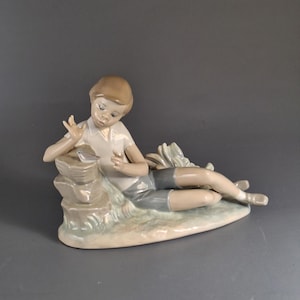 Lladro Porcelain Boy with Bird Figurine, Rare Collectible, Handcrafted Spanish Decor, Retired Vintage Piece, Ideal for Collectors, Find
