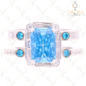 Sterling Silver Emerald Ring 10x7mm Fancy Blue 4.80Cts Emerald, Combination of Baguette and Round diamonds on Split Shank, White Gold Finish