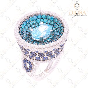 Hip-hop Ring 925 Silver, Unique Crown Ring, Aqua Blue 5.82Ct Oval Stone, with Blue Halo Accent CZ Diamonds, White Gold Finish