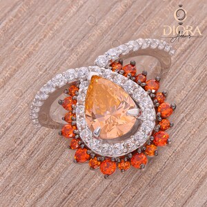 Unique Light Orange Pear Shape Center Stone, Halo Ring surrounded with round Orange and white small Round CZ,925 Silver Ring