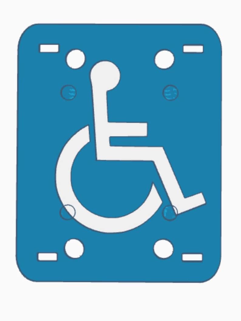 May include: A blue rectangular sign featuring the white International Symbol of Access, depicting a person in a wheelchair. The sign has rounded corners, white circles, and small rectangular cutouts for mounting.